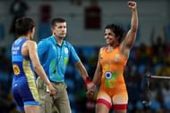 RIO DE JANEIRO, BRAZIL - AUGUST 17: Sakshi Malik of India (red) competes against Aisuluu Tynybekova of Kyrgyzstan during the Women's Freestyle 58 kg Bronze match on Day 12 of the Rio 2016 Olympic Games at Caioca Arena 2 on August 17, 2016 in Rio de Janeiro, Brazil. (Photo by Lars Baron/Getty Images)